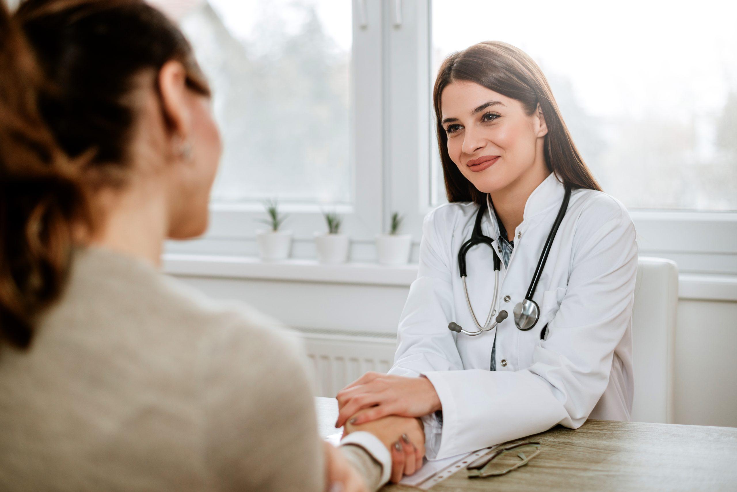 Female doctor assuring a patient undergoing blood in stool treatment in Hyderabad