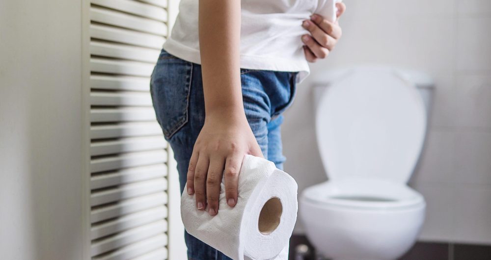 Man experiencing blood in stool